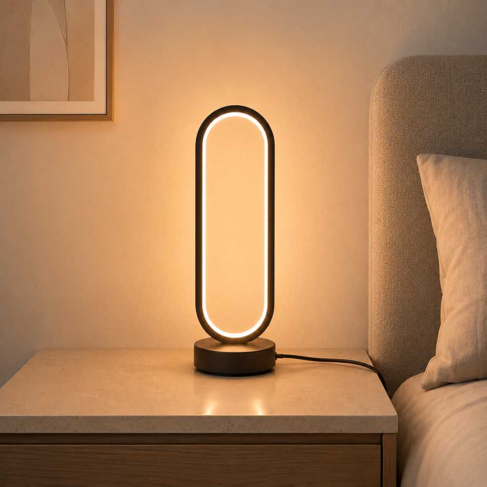 Lampe de chevet LED ovale noire diffusant une lumière chaude