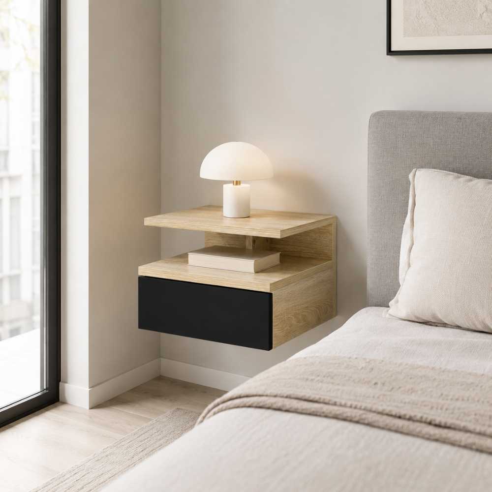 Table de chevet murale bois clair avec tiroir noir dans une chambre moderne